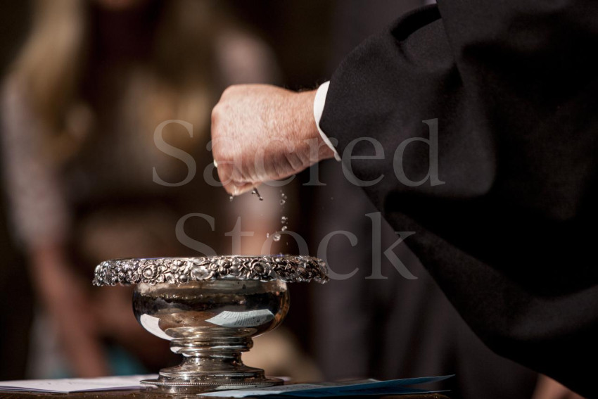 Baptism Waters in Hand